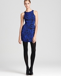 This sophisticated silk Dolce Vita dress flaunts a new view and hue on the classic zebra print--a fiercely celebrated trend this season. This sophisticated silk Dolce Vita dress flaunts a new view and hue on the classic zebra print--a fiercely celebrated trend this season.