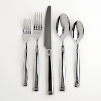 This set includes 12 each: dinner fork, dinner spoon, salad fork, teaspoon and dinner knife plus one each sugar shell, butter knife, serving spoon, slotted spoon and cold meat fork. This set includes 12 each: dinner fork, dinner spoon, salad fork, teaspoon and dinner knife plus one each sugar shell, butter knife, serving spoon, slotted spoon and cold meat fork.