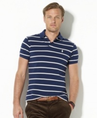 Sleek horizontal stripes lend a crisp, polished look to a relaxed-fitting polo shirt in breathable cotton mesh. Sleek horizontal stripes lend a crisp, polished look to a relaxed-fitting polo shirt in breathable cotton mesh.