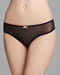 A charming mesh low-rise bikini with contrast trim and bow accent. A charming mesh low-rise bikini with contrast trim and bow accent.