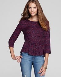 A playful peplum lends a feminine flounce to this silky-soft, polka-dotted Ella Moss top. A playful peplum lends a feminine flounce to this silky-soft, polka-dotted Ella Moss top.