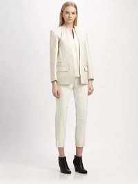 A chic, structural silhouette with a halter-style neckline and angular leather panels.Split jewel neckline with leather halter overlayConcealed front snap closureLong sleevesFront flap pocketsAbout 26½ from shoulder to hemVest: leatherSleeves and body: 64% viscose/36% cottonCupro liningDry clean with leather professionalImportedModel shown is 5'10 (178cm) wearing US size 4. A chic, structural silhouette with a halter-style neckline and angular leather panels.Split jewel neckline with leather halter overlayConcealed front snap closureLong sleevesFront flap pocketsAbout 26½ from shoulder to hemVest: leatherSleeves and body: 64% viscose/36% cottonCupro liningDry clean with leather professionalImportedModel shown is 5'10 (178cm) wearing US size 4.