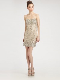Glittering sequins bring the glamour to this mini sheath dress styled with a comely sweetheart neckline.StraplessFlat frontFittedCenter back zipperAbout 18 from natural waistNylonDry cleanImportedModel shown is 5'10 (177cm) wearing US size 4. Glittering sequins bring the glamour to this mini sheath dress styled with a comely sweetheart neckline.StraplessFlat frontFittedCenter back zipperAbout 18 from natural waistNylonDry cleanImportedModel shown is 5'10 (177cm) wearing US size 4.