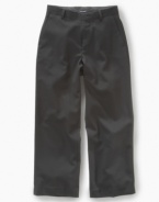 With an an elegant look and feel, these flat front pants from Calvin Klein are right for any occasion.