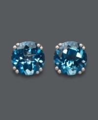 Dip into cool, blue hues. Round-cut London blue topaz (4-1/2 ct. t.w.) stud earrings are certain to make a splash! Crafted in 14k white gold. Approximate diameter: 8 mm. Dip into cool, blue hues. Round-cut London blue topaz (4-1/2 ct. t.w.) stud earrings are certain to make a splash! Crafted in 14k white gold. Approximate diameter: 8 mm.