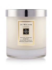 Inspired by a sun drenched morning in an English garden, White Jasmine & Mint captures the scent of jasmine, wild rose and white blossoms with an unexpected twist of wild mint. The White Jasmine & Mint Home Candle infuses any room with evocative scent and lasts for hours. An everyday luxury, it brings warmth to any environment. Lid included. Burn time, approx. 34 hours. Inspired by a sun drenched morning in an English garden, White Jasmine & Mint captures the scent of jasmine, wild rose and white blossoms with an unexpected twist of wild mint. The White Jasmine & Mint Home Candle infuses any room with evocative scent and lasts for hours. An everyday luxury, it brings warmth to any environment. Lid included. Burn time, approx. 34 hours.