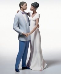 From anniversaries to honeymoons, this beautiful figurine makes a gift for the happy couple to be remembered. Stands 11.75 tall. From anniversaries to honeymoons, this beautiful figurine makes a gift for the happy couple to be remembered. Stands 11.75 tall.