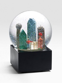 EXCLUSIVELY OURS. The Dallas musical water globe features city scenes and landmarks including: Reunion Tower, Magnolia Building First Interstate Tower, Big Tex and more Plays Deep In The Heart Of Texas Glass dome and resin figures 6 high Imported