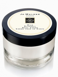 Immerse yourself in a mesmerizing sea of wild flowers, misted with dew. Fresh bluebell, radiant lily of the valley and exquisite eglantine, showered with the sparkling succulence of persimmon and lemon. Wild Bluebell Body Creme, an exquisite combination of texture and scent, is the utmost indulgence. It keeps skin soft and pampered every day. 5.9 oz. Immerse yourself in a mesmerizing sea of wild flowers, misted with dew. Fresh bluebell, radiant lily of the valley and exquisite eglantine, showered with the sparkling succulence of persimmon and lemon. Wild Bluebell Body Creme, an exquisite combination of texture and scent, is the utmost indulgence. It keeps skin soft and pampered every day. 5.9 oz.