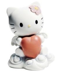 This heaven-sent Hello Kitty figurine has the wings and heart of an angel in beautifully glazed porcelain from Nao by Lladro. This heaven-sent Hello Kitty figurine has the wings and heart of an angel in beautifully glazed porcelain from Nao by Lladro.