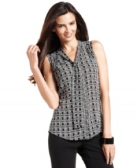 Alfani's petite blouse features a sophisticated tie-neck and chic graphic-print -- perfect from desk to dinner!