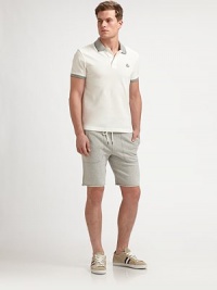 Casual cut-offs as comfortable as your favorite cotton sweatshirt.Drawstring waistSide pocketsBack pocket with logo detailUnfinished hemInseam, about 9CottonMachine washMade in Italy Casual cut-offs as comfortable as your favorite cotton sweatshirt.Drawstring waistSide pocketsBack pocket with logo detailUnfinished hemInseam, about 9CottonMachine washMade in Italy