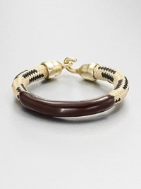 A bold piece with glossy enamel painted accents on thick, braided rope. EnamelRopeBrass-plated metalLength, about 7.5Hook closureMade in USA A bold piece with glossy enamel painted accents on thick, braided rope. EnamelRopeBrass-plated metalLength, about 7.5Hook closureMade in USA