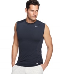 In motion. Stay going strong with this fitted sleeveless t-shirt from Nike featuring Dri-Fit technology. In motion. Stay going strong with this fitted sleeveless t-shirt from Nike featuring Dri-Fit technology.