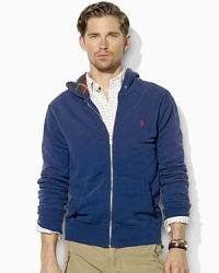 Crafted from lightweight fleece for easy on-the-go styling, a classic full-zip hoodie gets a bold update with a printed pattern inside the hood. Crafted from lightweight fleece for easy on-the-go styling, a classic full-zip hoodie gets a bold update with a printed pattern inside the hood.