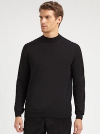 A sophisticated layer with a ribbed mockneck collar in soft merino wool.Ribbed mockneck collarLong sleeves with ribbed cuffsRibbed hemMerino woolDry cleanImported A sophisticated layer with a ribbed mockneck collar in soft merino wool.Ribbed mockneck collarLong sleeves with ribbed cuffsRibbed hemMerino woolDry cleanImported