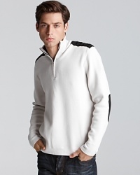 Mockneck sweater with a rugged double zip front, nylon accents at the yoke and elbows and a ribbed stand collar. Mockneck sweater with a rugged double zip front, nylon accents at the yoke and elbows and a ribbed stand collar.