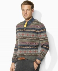 Knit from hearty wool yarns, a timeless V-neck sweater boasts a classic Fair Isle pattern for an authentic, handsome look. Knit from hearty wool yarns, a timeless V-neck sweater boasts a classic Fair Isle pattern for an authentic, handsome look.