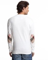 Long sleeve crewneck shirt in a soft cotton with check elbow patches.