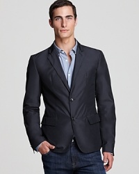 Transform your outerwear into a sport coat with this wry design from Elie Tahari, shaped for a tailored fit in lightweight nylon. Transform your outerwear into a sport coat with this wry design from Elie Tahari, shaped for a tailored fit in lightweight nylon.