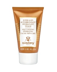 Sisley Paris Self Tanning Hydrating Facial Skin Care enhances the complexion, prolongs the tan and embellishes the skin.From the first application, its fluid texture embellishes even fair skin with a natural golden tan, without streaking. After four weeks of application, the tan is lasting and even, and the skin is perfectly moisturized and comfortable. Sisley Paris Self Tanning Hydrating Facial Skin Care enhances the complexion, prolongs the tan and embellishes the skin.From the first application, its fluid texture embellishes even fair skin with a natural golden tan, without streaking. After four weeks of application, the tan is lasting and even, and the skin is perfectly moisturized and comfortable.