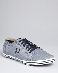 Herringbone stripes and a fresh pink sole makes these preppy-perfect sneakers from Fred Perry a great option with khakis or jeans. Herringbone stripes and a fresh pink sole makes these preppy-perfect sneakers from Fred Perry a great option with khakis or jeans.