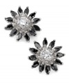 Pull out all the stops with sparkling flower studs in vintage style. City by City earrings feature glistening, jet black cubic zirconia petals with a clear cubic zirconia center (5-1/4 ct. t.w.). Crafted in silver tone mixed metal.