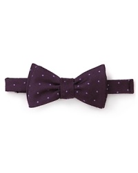 Update the classic bowtie with polka dots to add a brilliant burst of color to your look. Update the classic bowtie with polka dots to add a brilliant burst of color to your look.