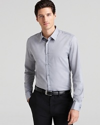 This button-down shirt fits right in to your work wardrobe, featuring a solid color that's easy to pair with a variety of trousers. This button-down shirt fits right in to your work wardrobe, featuring a solid color that's easy to pair with a variety of trousers.