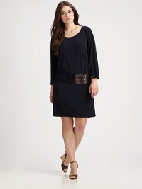 When envisioning an everyday-chic dress, this jersey design should come to mind. It offers a hint of stretch and an elongating, dropped waist that will make you look (and feel) incredible. ScoopneckThree-quarter sleevesLeather-tab belt detail at dropped waistPull-on styleAbout 24 from natural waist94% polyester/6% spandexMachine washImported When envisioning an everyday-chic dress, this jersey design should come to mind. It offers a hint of stretch and an elongating, dropped waist that will make you look (and feel) incredible. ScoopneckThree-quarter sleevesLeather-tab belt detail at dropped waistPull-on styleAbout 24 from natural waist94% polyester/6% spandexMachine washImported