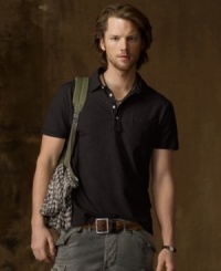 An iconic polo design is created in a soft slub mesh construction and heavily washed, making the perpetually preppy basic more rugged than ever. An iconic polo design is created in a soft slub mesh construction and heavily washed, making the perpetually preppy basic more rugged than ever.