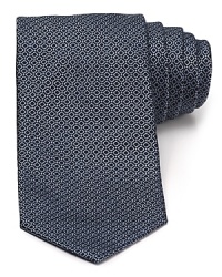 Whether you're speaking at the conference or giving a toast for a friend, this stately tie from Armani Collezioni gives your words an added authority. Whether you're speaking at the conference or giving a toast for a friend, this stately tie from Armani Collezioni gives your words an added authority.
