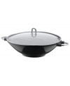 Make it wok. Every chef's staple in the kitchen, this versatile everyday do-it-all combines high, rounded sides with an enameled cast iron construction that heats up fast and dishes out delicious stir fry and more. The convenient wok rack lets you roast, steam and simmer veggies and meat at the same time, while the glass lid traps in moisture and flavor for unbelievable results.