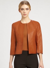 Equal parts elegant and edgy, this cropped leather style is finished with a delicate perforated texture.Jewel necklineThree-quarter sleevesVented cuffsHook-and-eye closuresSilk liningAbout 19 from shoulder to hemLeatherDry cleanImportedModel shown is 5'11 (180cm) wearing US size 4. Equal parts elegant and edgy, this cropped leather style is finished with a delicate perforated texture.Jewel necklineThree-quarter sleevesVented cuffsHook-and-eye closuresSilk liningAbout 19 from shoulder to hemLeatherDry cleanImportedModel shown is 5'11 (180cm) wearing US size 4.