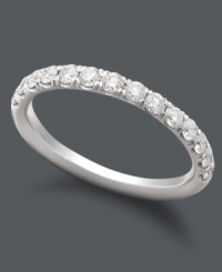 Celebrate a lifetime of happiness. This stunning wedding band sparkles with the addition of round-cut pave-set diamonds (1/2 ct. t.w.). Crafted in 18k white gold. Celebrate a lifetime of happiness. This stunning wedding band sparkles with the addition of round-cut pave-set diamonds (1/2 ct. t.w.). Crafted in 18k white gold.