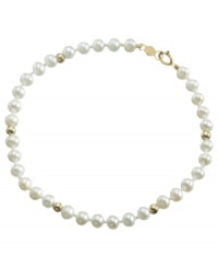 Everyday elegance, fit for any age. This lovely simulated pearl bracelet is accented with 14k gold beads. Everyday elegance, fit for any age. This lovely simulated pearl bracelet is accented with 14k gold beads.