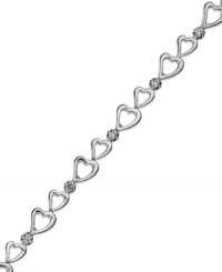 Follow your heart. Victoria Townsend's adorable bracelet features a row of open-cut hearts and shining diamond accents in sterling silver. Approximate length: 7 inches. Follow your heart. Victoria Townsend's adorable bracelet features a row of open-cut hearts and shining diamond accents in sterling silver. Approximate length: 7 inches.