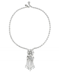 Totally trendy. Just as fringe embellishment is a hip look in handbags, Monet innovatively incorporates it into a chic collar necklace. Adorned with sparkling Swarovski crystals, it's set in silver tone mixed metal. Approximate length: 18 inches. Approximate drop: 2-3/4 inches. Totally trendy. Just as fringe embellishment is a hip look in handbags, Monet innovatively incorporates it into a chic collar necklace. Adorned with sparkling Swarovski crystals, it's set in silver tone mixed metal. Approximate length: 18 inches. Approximate drop: 2-3/4 inches.