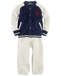 An essential preppy set combines an athletic-inspired hoodie and an athletic pant, both rendered in ultra-soft fleece. An essential preppy set combines an athletic-inspired hoodie and an athletic pant, both rendered in ultra-soft fleece.