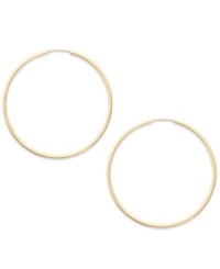 Forever stylish, forever chic. This pair of endless hoop earrings comes in 14k gold. Approximate diameter: 35 mm.