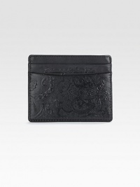 Store your business and credit cards in style with this compact case of smooth grain leather on one side and embossed paisley-printed leather on the other, finished with a signature cotton trim.Five card slotsCotton twill/leather liningLeather4W x 3HImported Store your business and credit cards in style with this compact case of smooth grain leather on one side and embossed paisley-printed leather on the other, finished with a signature cotton trim.Five card slotsCotton twill/leather liningLeather4W x 3HImported