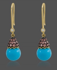 A unique blend of colors adds vibrant elegance to any look. Carlo Viani's exquisite drop earrings highlight a turquoise bead (9-5/8 mm) capped with sparkling chocolate diamonds (5/8 ct. t.w.) and topped off by a white diamond accent. Crafted in 14k gold. Approximate drop: 1-1/4 inches. A unique blend of colors adds vibrant elegance to any look. Carlo Viani's exquisite drop earrings highlight a turquoise bead (9-5/8 mm) capped with sparkling chocolate diamonds (5/8 ct. t.w.) and topped off by a white diamond accent. Crafted in 14k gold. Approximate drop: 1-1/4 inches.