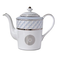 Carefully rendered in a style reminiscent of neoclassic trompe l'oeil-a French term for artwork that depicts optical illusions-a captivating geometric rosette motif traverses this elegant porcelain coffee pot from Bernardaud. Delicate shades of ice blue, mother-of-pearl and gray are enhanced by a fine platinum trim and medallion design. Carefully rendered in a style reminiscent of neoclassic trompe l'oeil-a French term for artwork that depicts optical illusions-a captivating geometric rosette motif traverses this elegant porcelain coffee pot from Bernardaud. Delicate shades of ice blue, mother-of-pearl and gray are enhanced by a fine platinum trim and medallion design.