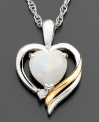 Ebullient opal (3/4 ct. t.w.) looks lovely as ever in this fabulous heart pendant complete with diamond accents and set in 14k gold and sterling silver. Approximate length: 18 inches. Approximate drop: 3/4 inch. Ebullient opal (3/4 ct. t.w.) looks lovely as ever in this fabulous heart pendant complete with diamond accents and set in 14k gold and sterling silver. Approximate length: 18 inches. Approximate drop: 3/4 inch.