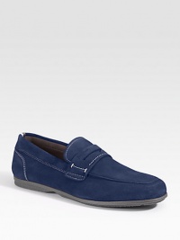 The classic penny loafter in butter-rich suede, finished with a durable rubber sole.Suede upperPadded insoleRubber soleMade in Italy The classic penny loafter in butter-rich suede, finished with a durable rubber sole.Suede upperPadded insoleRubber soleMade in Italy