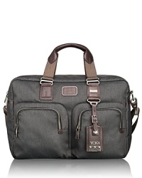 A practical bag that navigates seamlessly between business and casual travel doesn't have to skimp on style, and this design from Tumi offers strong organizational construction with a sleek shape and color scheme for a powerfully sharp companion wherever you go. A practical bag that navigates seamlessly between business and casual travel doesn't have to skimp on style, and this design from Tumi offers strong organizational construction with a sleek shape and color scheme for a powerfully sharp companion wherever you go.