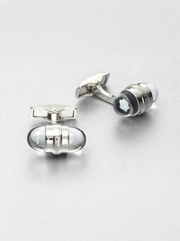 Signature cuff links, finished in platinum highlighted by a floating embossed emblem stars.PlatinumAbout 1 diam.Imported