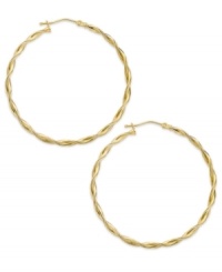Twisted hoops add a layer of dimension and polish to any look. Crafted in 14k gold with a lever backing. Approximate diameter: 1-1/2 inches. Twisted hoops add a layer of dimension and polish to any look. Crafted in 14k gold with a lever backing. Approximate diameter: 1-1/2 inches.
