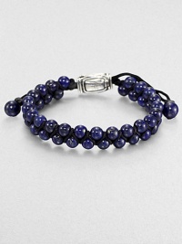 From the Spirited Bead Collection, this two-row beaded bracelet is handsomely crafted from 6mm lapis beads with an adjustable sterling silver beaded clasp.Sterling silverLapisAbout 9 longAbout 3 diam.Imported