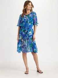 A divine watercolor print decorates this ethereal self-tie coverup for a positively feminine look.Round neckKeyhole detailFlutter sleevesPull-on styleRemovable self-tieSilkHand washImported A divine watercolor print decorates this ethereal self-tie coverup for a positively feminine look.Round neckKeyhole detailFlutter sleevesPull-on styleRemovable self-tieSilkHand washImported